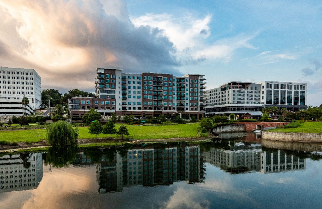 Millstream at Cascades building and surroundings, seen from across the water feature